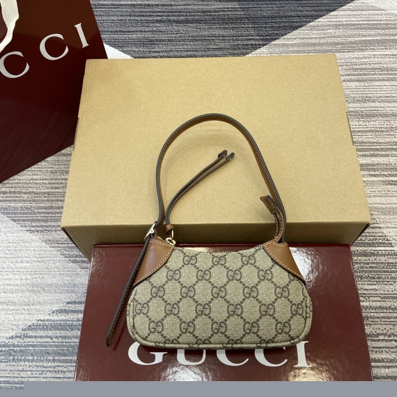 G*u*i top handle bags